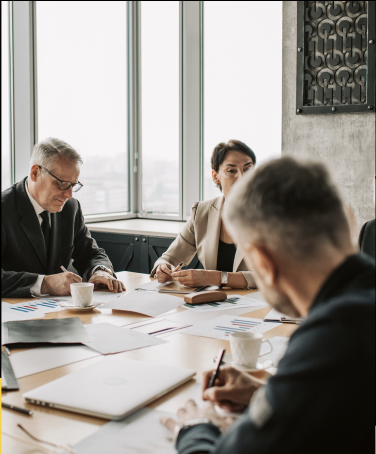 Business meeting discussing international education strategy